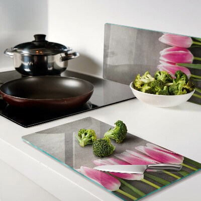 Glass chopping board Tulips on a gray background