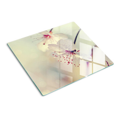 Glass kitchen board Flowers on a geometric background