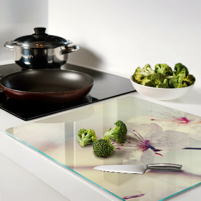Glass kitchen board Flowers on a geometric background
