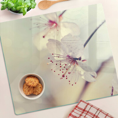 Glass kitchen board Flowers on a geometric background