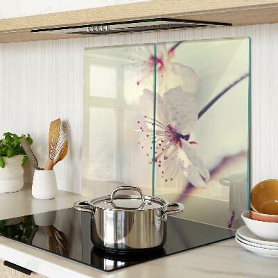 Glass kitchen board Flowers on a geometric background