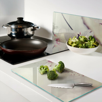 Glass kitchen board Flowers on a geometric background
