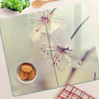 Glass kitchen board Flowers on a geometric background