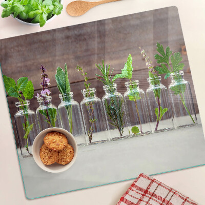 Glass kitchen board Plants in bottles