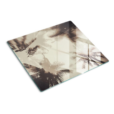 Glass kitchen board Palm trees on a monochrome background