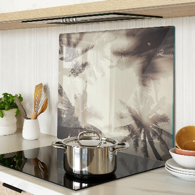 Glass kitchen board Palm trees on a monochrome background