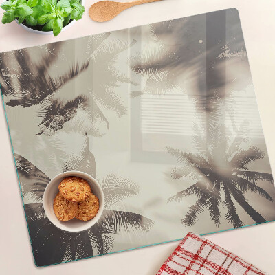 Glass kitchen board Palm trees on a monochrome background