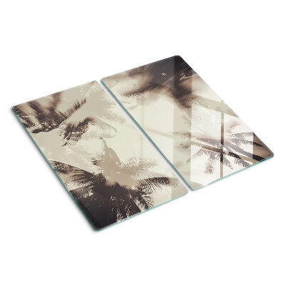 Glass kitchen board Palm trees on a monochrome background