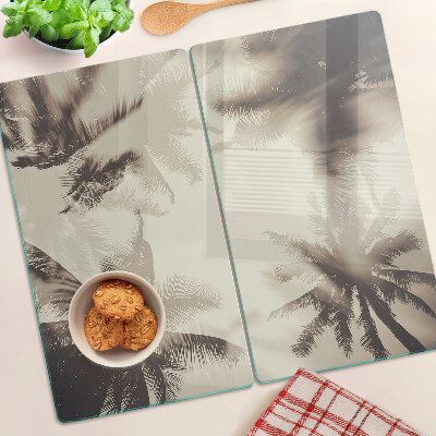 Glass kitchen board Palm trees on a monochrome background