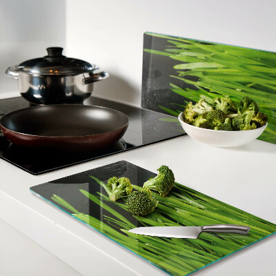 Glass chopping board Green grass with water drops