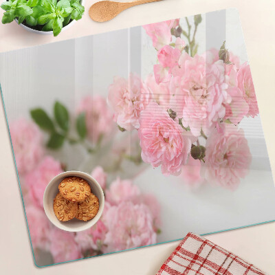 Glass kitchen board Pink flowers in a vase