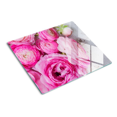 Glass kitchen board Pink flowers in a bouquet