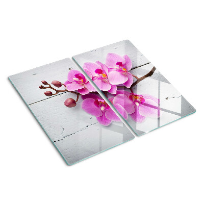 Glass chopping board Orchids on a white background