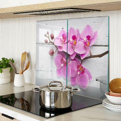 Glass chopping board Orchids on a white background