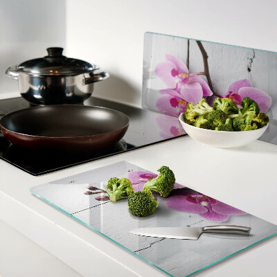Glass chopping board Orchids on a white background