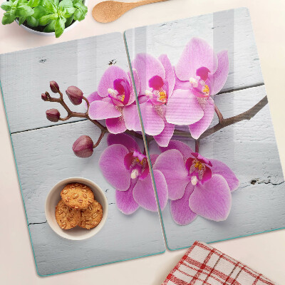 Glass chopping board Orchids on a white background
