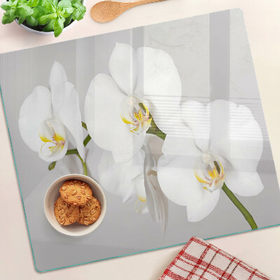 Glass chopping board Orchids on a mirror background