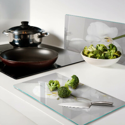 Glass chopping board Orchids on a mirror background
