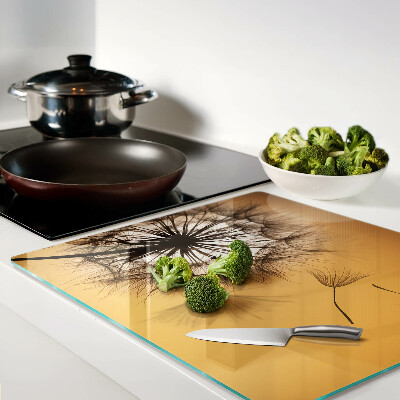 Glass kitchen board Dandelions against the sunset