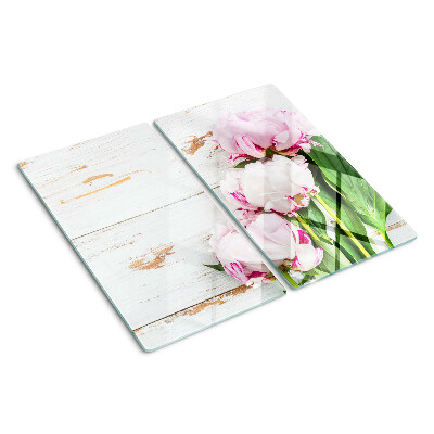 Glass kitchen board Peony flowers on a wood background