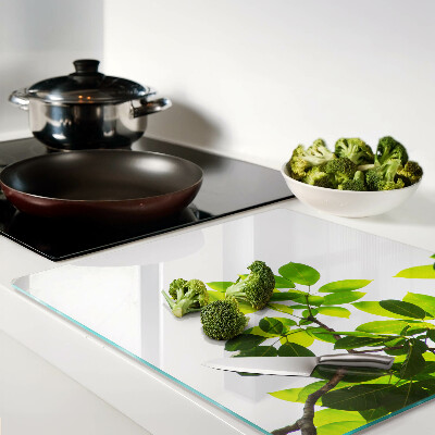 Glass chopping board Leaves against a bright sky