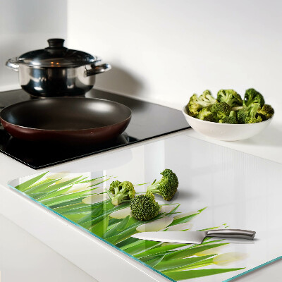 Glass chopping board Tulips in the green grass