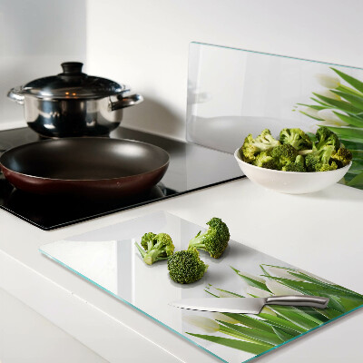 Glass chopping board Tulips in the green grass