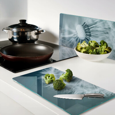 Glass chopping board Dandelions against the sky
