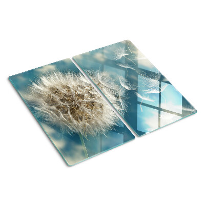 Glass kitchen board Dandelions against the sky