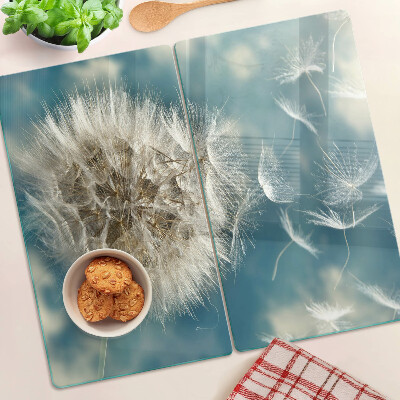 Glass kitchen board Dandelions against the sky