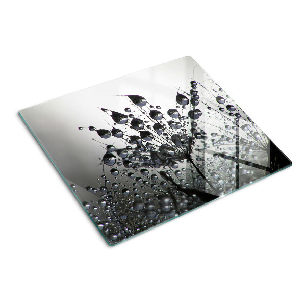 Glass chopping board Water drops on plants