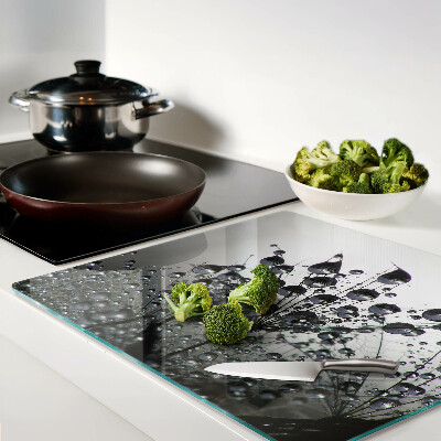 Glass chopping board Water drops on plants