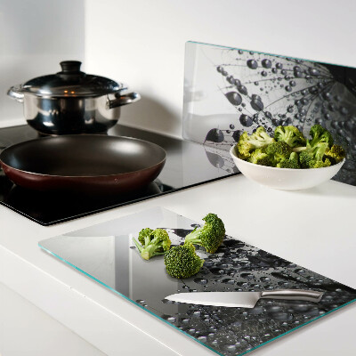 Glass chopping board Water drops on plants