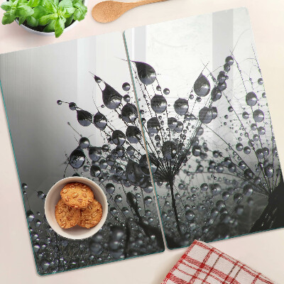 Glass chopping board Water drops on plants