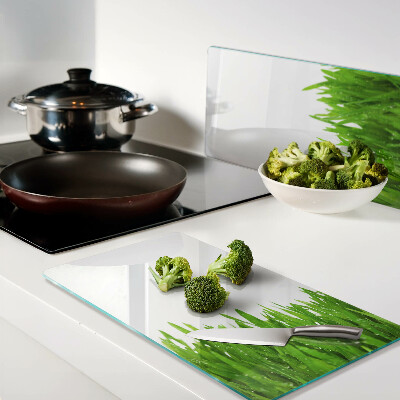 Glass chopping board Green grass with water drops