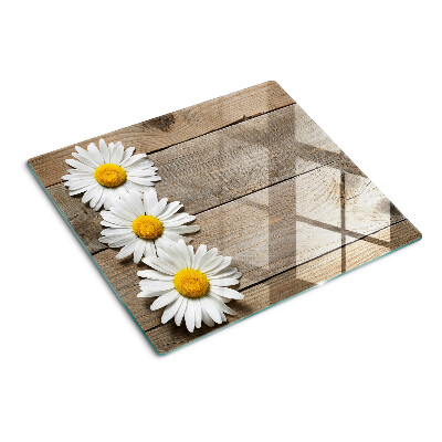 Glass chopping board Flowers on a wood background