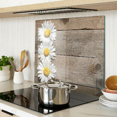 Glass chopping board Flowers on a wood background