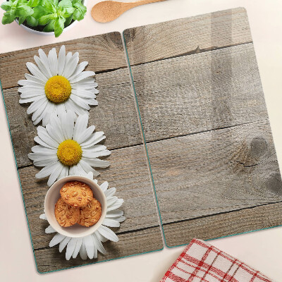 Glass chopping board Flowers on a wood background