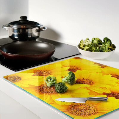 Glass chopping board Sunflowers on a yellow background
