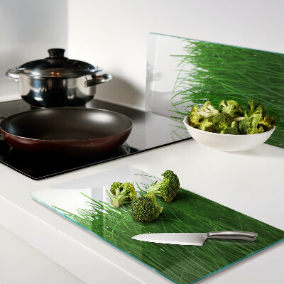Glass chopping board Grass in the sun