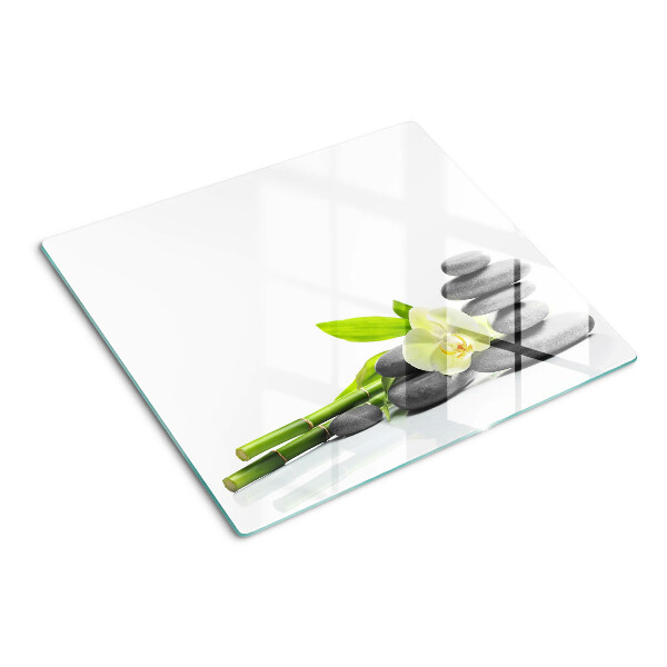 Glass kitchen board Orchid and spa stones
