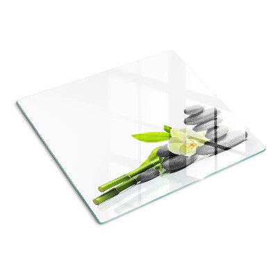Glass kitchen board Orchid and spa stones