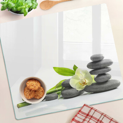 Glass kitchen board Orchid and spa stones