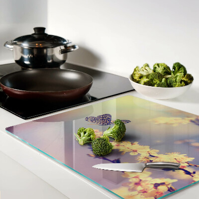 Glass chopping board Butterfly motif on a flower background