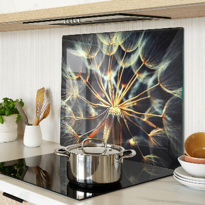Glass chopping board Dandelions in macro photography