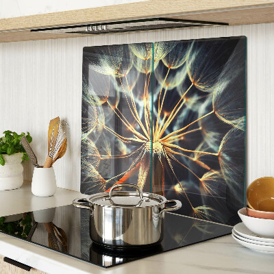 Glass chopping board Dandelions in macro photography