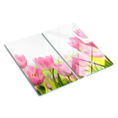 Glass kitchen board Pink tulips in the garden