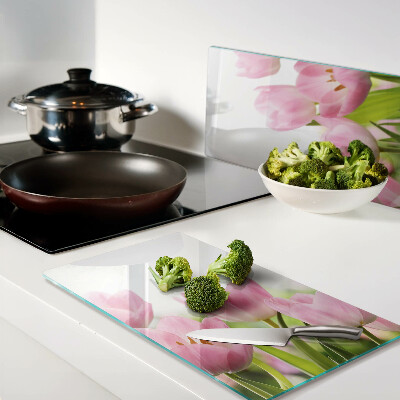 Glass kitchen board Pink tulips in the garden