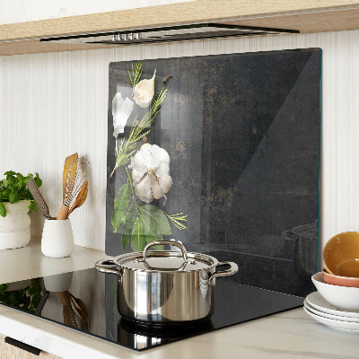 Glass chopping board Flowers and herbs on a marble background