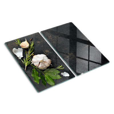 Glass chopping board Flowers and herbs on a marble background